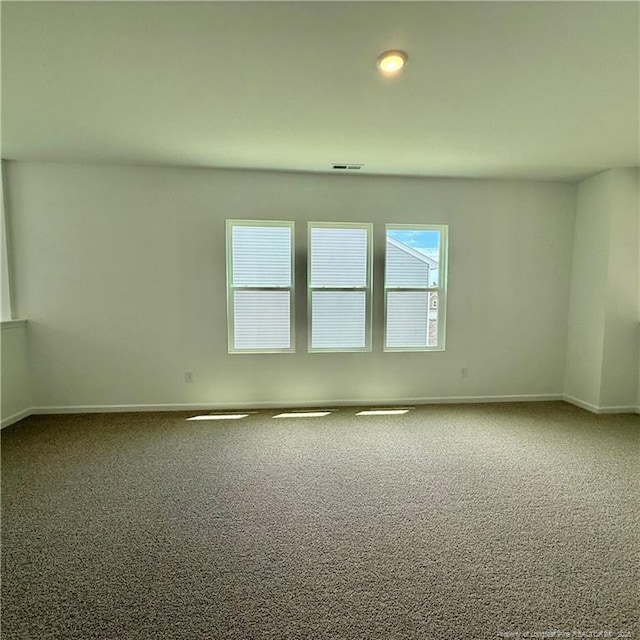 659 Union St, Home, Raeford, NC 28376 - carpeted empty room featuring baseboards