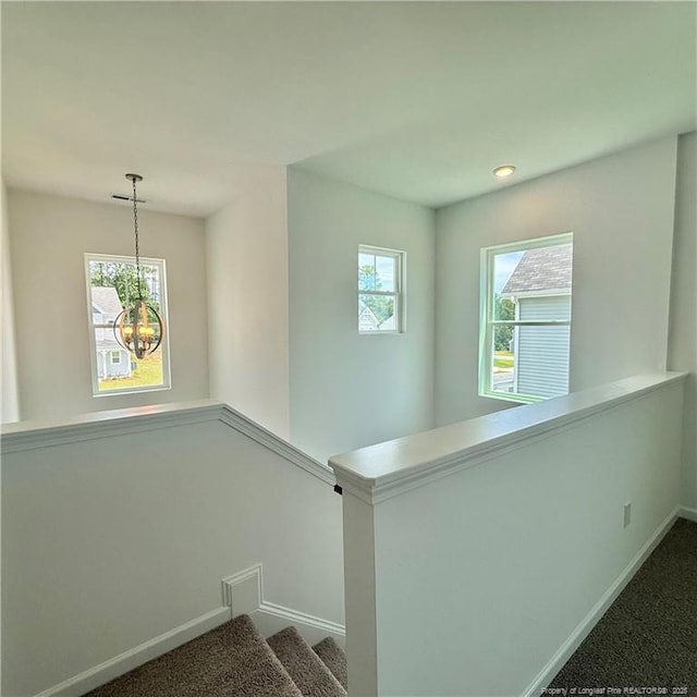 659 Union St, Home, Raeford, NC 28376 - staircase with carpet floors, a chandelier, plenty of natural light, and recessed lighting
