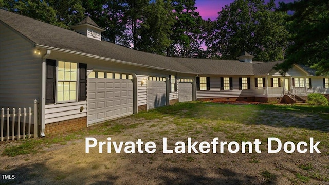 view of home's exterior with crawl space and a garage