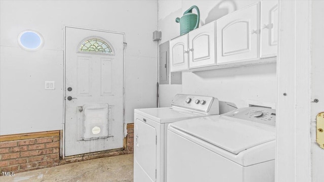 washroom featuring cabinet space and independent washer and dryer