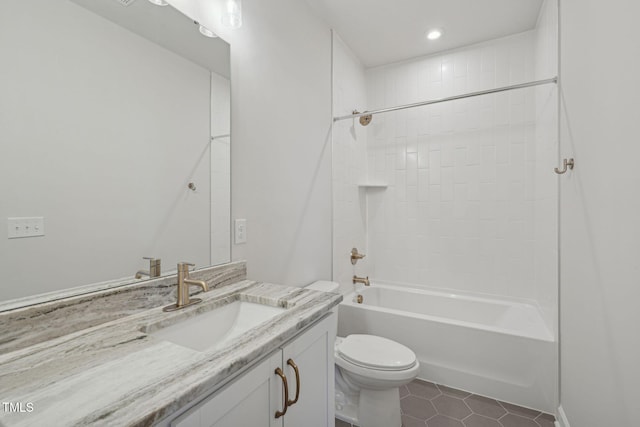 bathroom featuring toilet, tile patterned floors,  shower combination, vanity, and recessed lighting