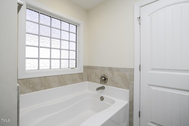 full bathroom featuring a garden tub