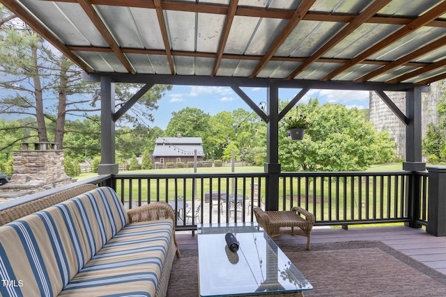 wooden terrace featuring an outdoor hangout area