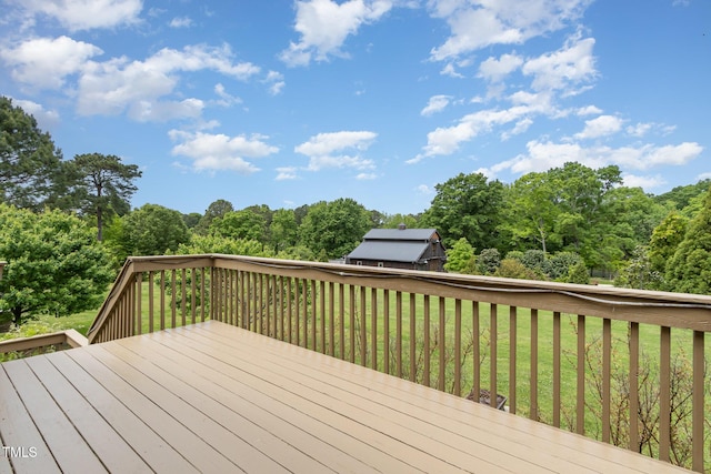 deck featuring a yard