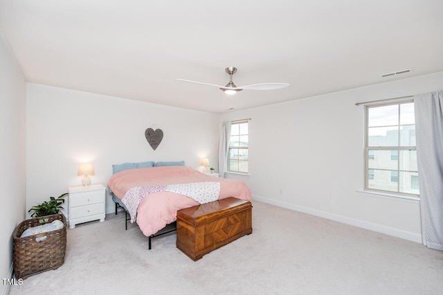 bedroom featuring carpet, visible vents, ceiling fan, and baseboards