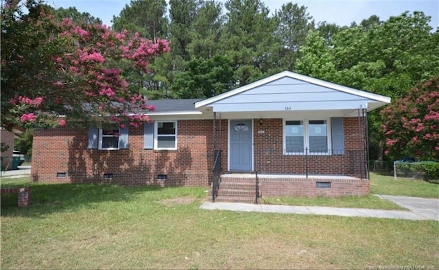 view of front facade with crawl space, a porch, a front lawn, and brick siding