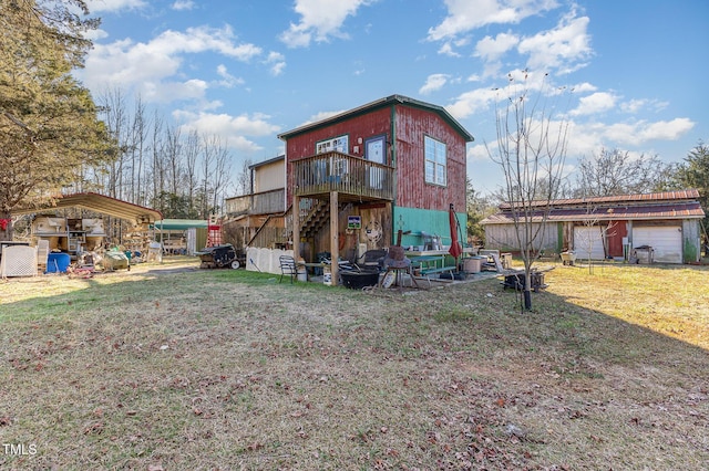 rear view of house featuring a detached carport