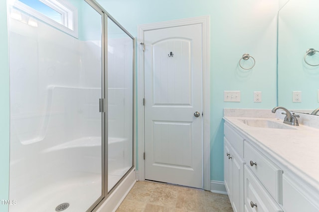 full bath featuring a shower stall and vanity