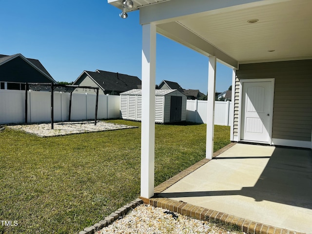 3827 Bucklin Dr NE, Elm City, NC 27822 - view of yard with a patio, a storage shed, and an outbuilding
