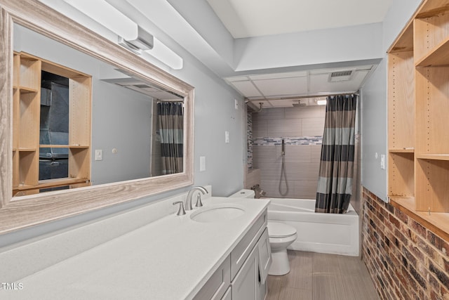 bathroom with visible vents, shower / bath combo with shower curtain, vanity, and toilet