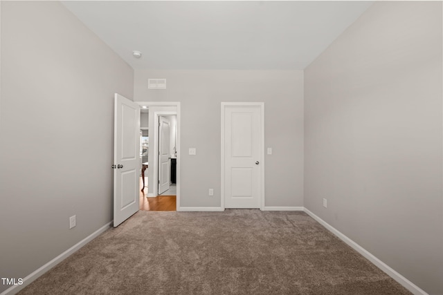 3356 Longleaf Estates Dr, Raleigh, NC 27616 - unfurnished bedroom with baseboards, carpet floors, and visible vents