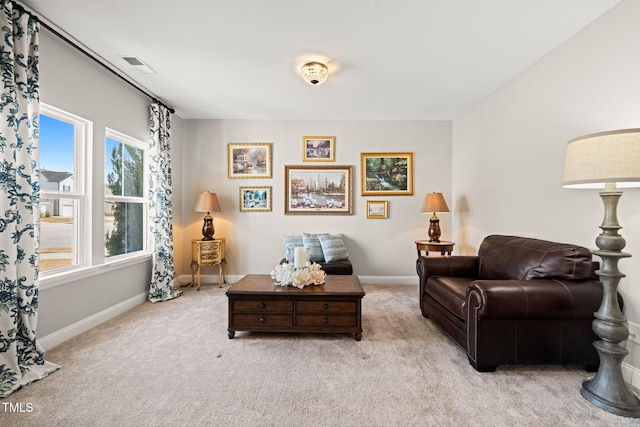 3356 Longleaf Estates Dr, Raleigh, NC 27616 - carpeted living room with visible vents and baseboards