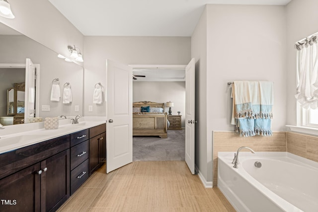 3356 Longleaf Estates Dr, Raleigh, NC 27616 - ensuite bathroom featuring a sink, double vanity, ensuite bathroom, and a healthy amount of sunlight