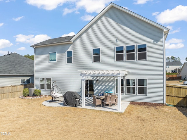 3356 Longleaf Estates Dr, Raleigh, NC 27616 - back of house featuring central air condition unit, a lawn, a fenced backyard, a pergola, and a patio
