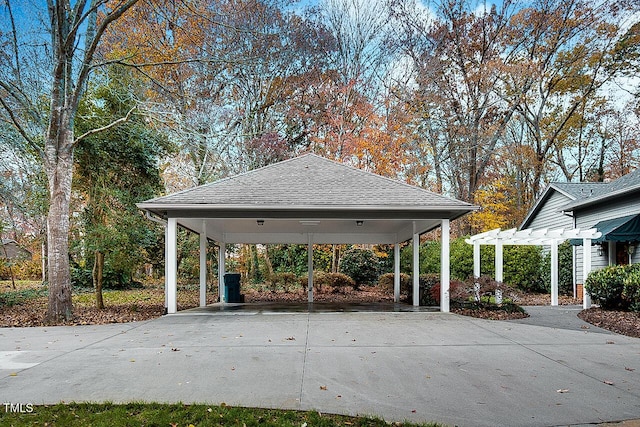 exterior space with a carport and driveway