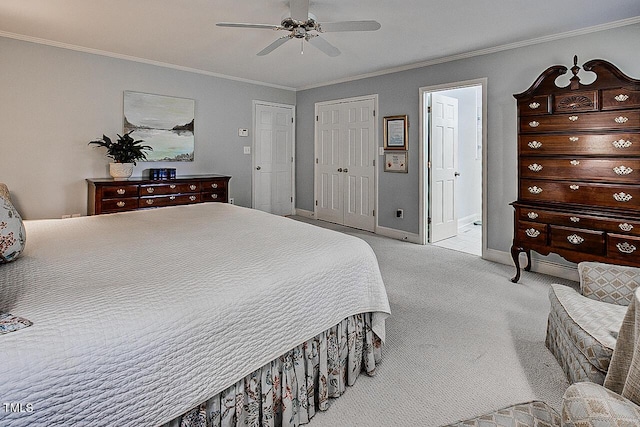 bedroom with carpet floors, ceiling fan, baseboards, and crown molding