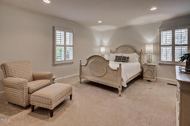 carpeted bedroom with ornamental molding, recessed lighting, visible vents, and baseboards