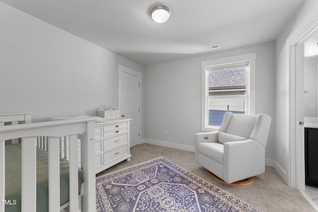 bedroom with light carpet, baseboards, and visible vents