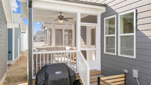 exterior space with ceiling fan