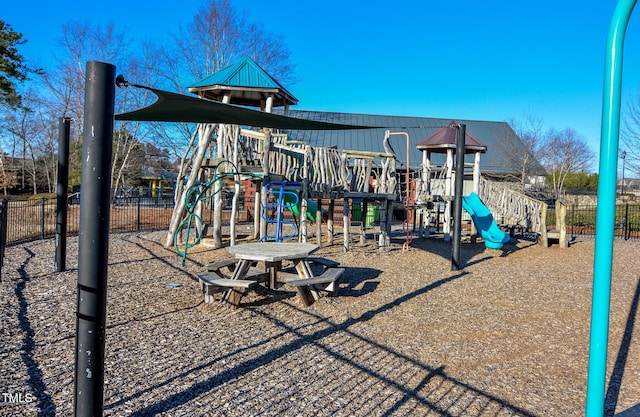 community jungle gym with fence