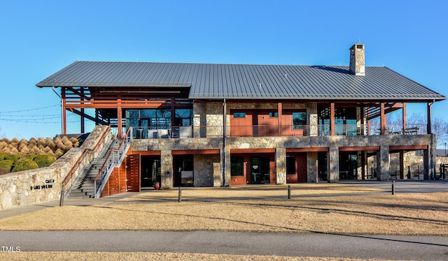 view of building exterior with stairs