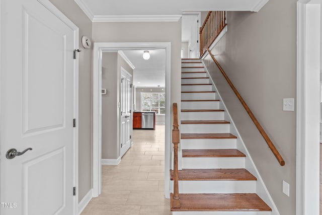 stairs with tile patterned flooring, crown molding, and baseboards