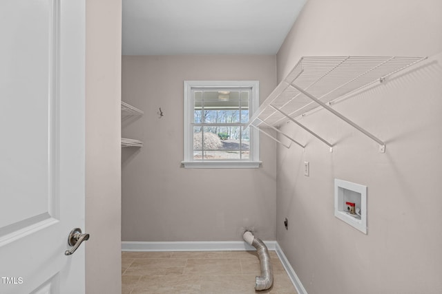 laundry room featuring laundry area, baseboards, and washer hookup