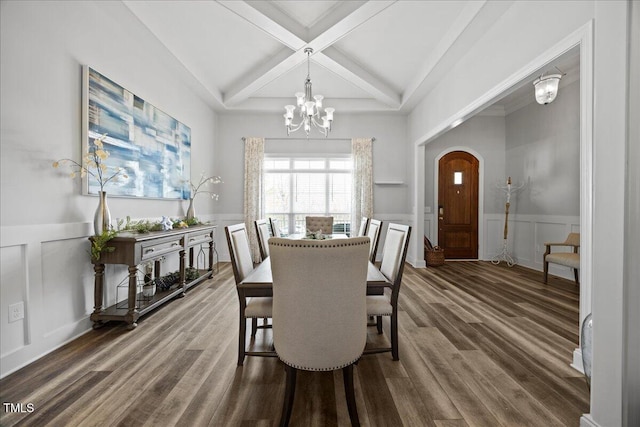 dining area with coffered ceiling, a chandelier, dark wood-type flooring, and beam ceiling