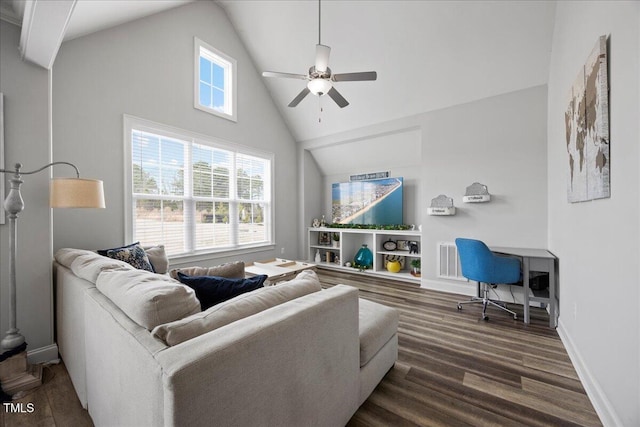 living room featuring a ceiling fan, visible vents, plenty of natural light, and baseboards