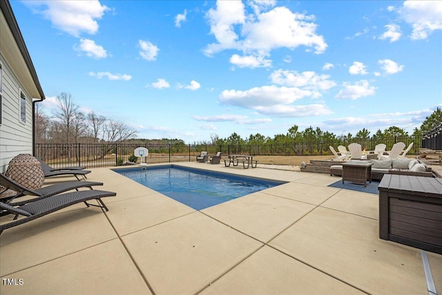 view of pool with a patio area, a fenced backyard, and a fenced in pool