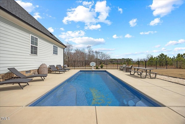 view of swimming pool with a fenced in pool, a patio area, and fence