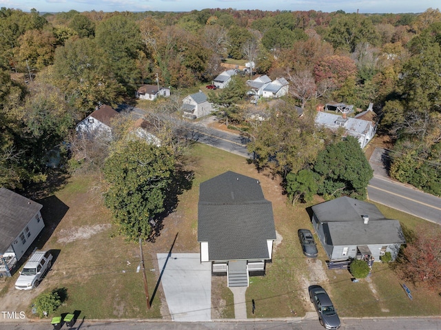 aerial view featuring a view of trees