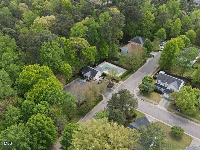 drone / aerial view with a view of trees