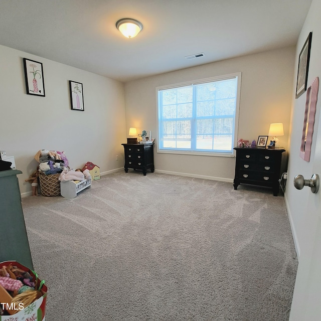 game room featuring carpet, visible vents, and baseboards