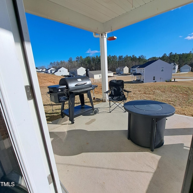 view of patio featuring a residential view and area for grilling