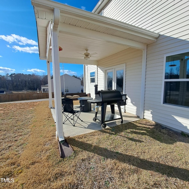 view of patio / terrace featuring a ceiling fan and grilling area