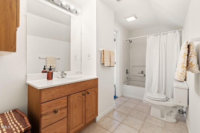 bathroom featuring baseboards, toilet, tile patterned flooring, shower / bath combo with shower curtain, and vanity