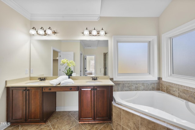 bathroom featuring double vanity, a garden tub, ornamental molding, and a sink