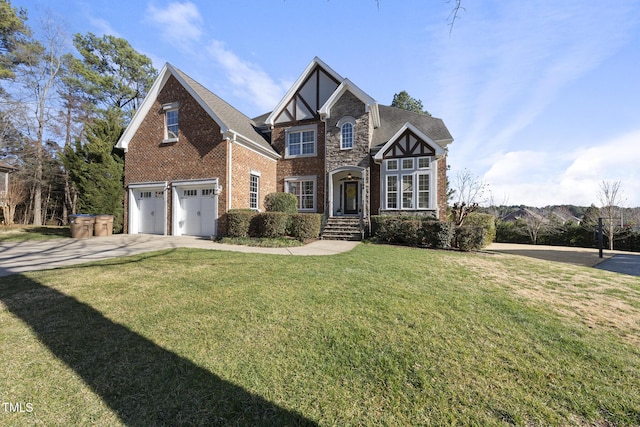 english style home with brick siding, a shingled roof, concrete driveway, a front yard, and a garage