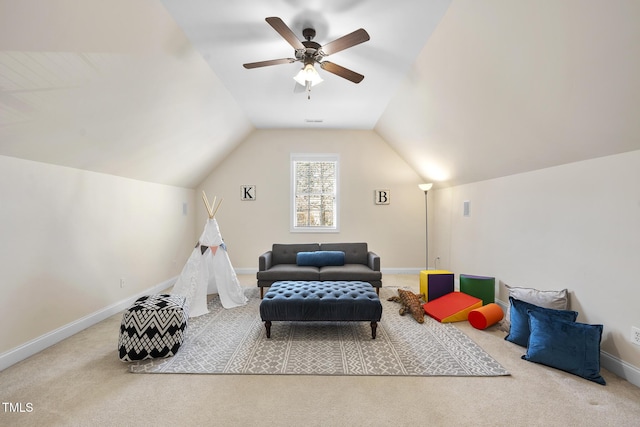 game room featuring vaulted ceiling, ceiling fan, carpet, and baseboards