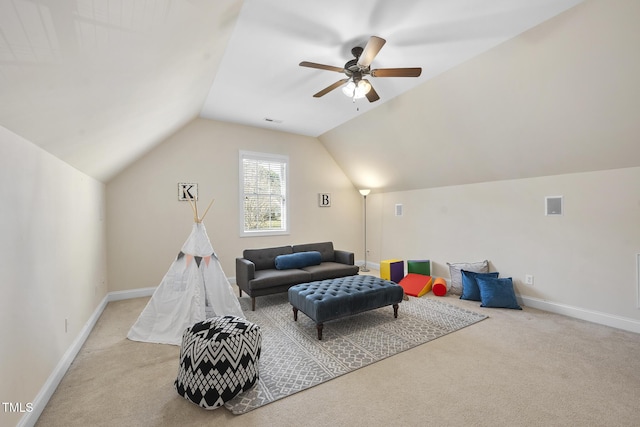 interior space featuring visible vents, baseboards, vaulted ceiling, and carpet flooring