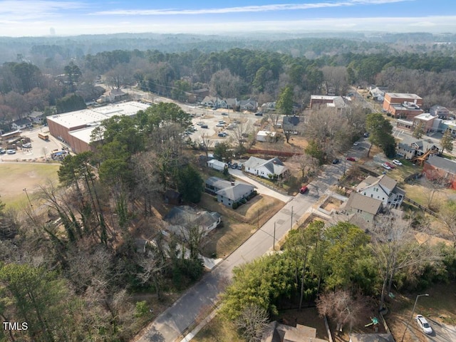 aerial view featuring a forest view