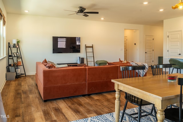 living area featuring ceiling fan, baseboards, dark wood finished floors, and recessed lighting