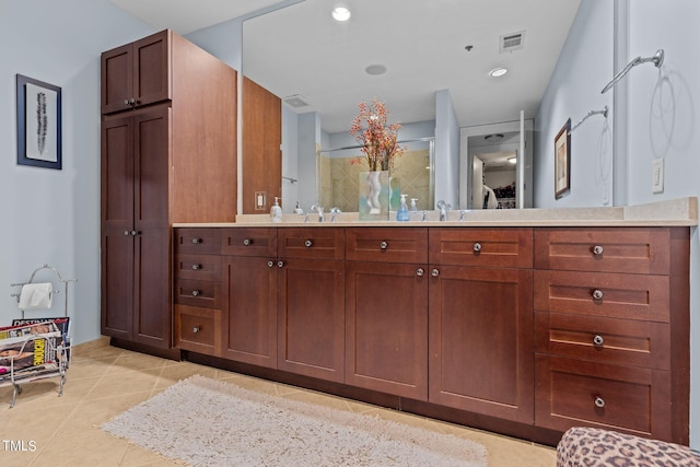 full bath featuring visible vents, tile patterned flooring, vanity, a shower stall, and recessed lighting