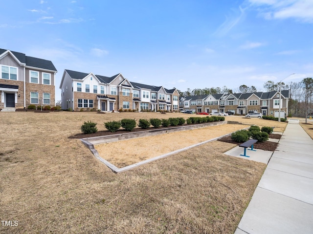 surrounding community featuring a residential view