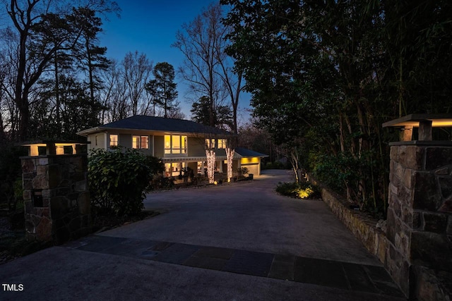 view of front of property with decorative driveway