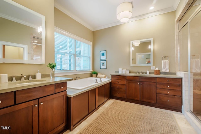 full bath with a garden tub, ornamental molding, a stall shower, and a sink