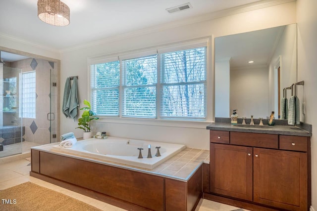 full bathroom with visible vents, plenty of natural light, and crown molding