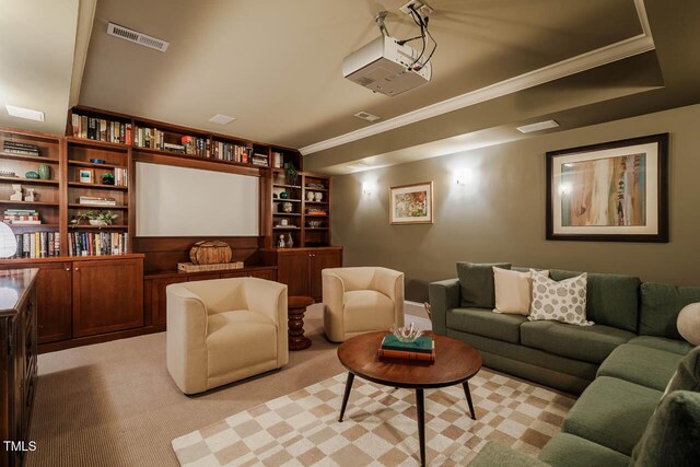 living area featuring visible vents, light colored carpet, and ornamental molding