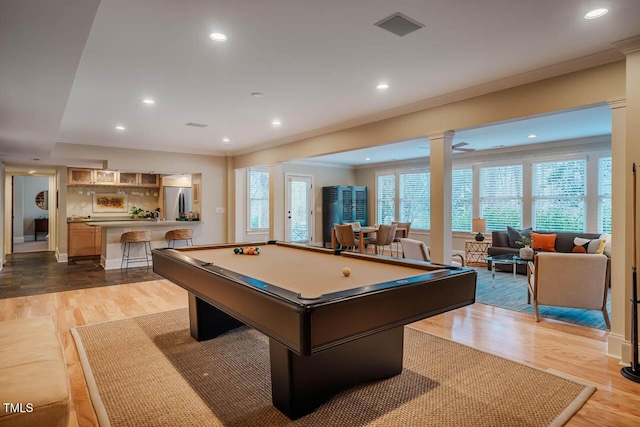 game room featuring pool table, recessed lighting, wood finished floors, and ornamental molding